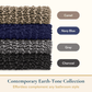 Stack of textured bath mats in camel, navy blue, gray, and charcoal with color swatches and text on a beige background.