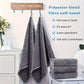 Gray towels hanging on a rack with text highlighting features like softness, absorbency, and ease of use.