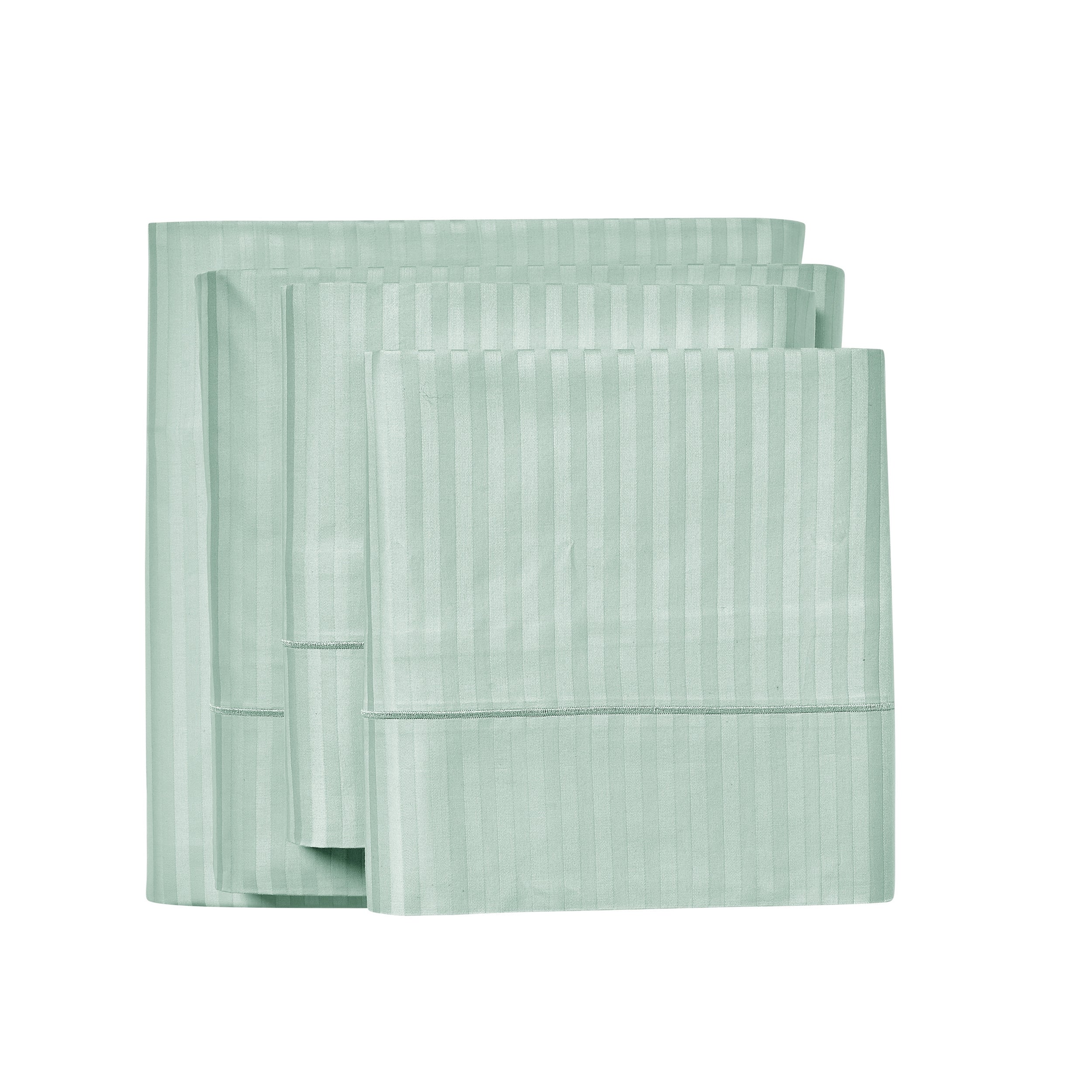 Set of light green folded towels on a white background