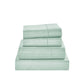 Stack of light green bed sheets on a white background