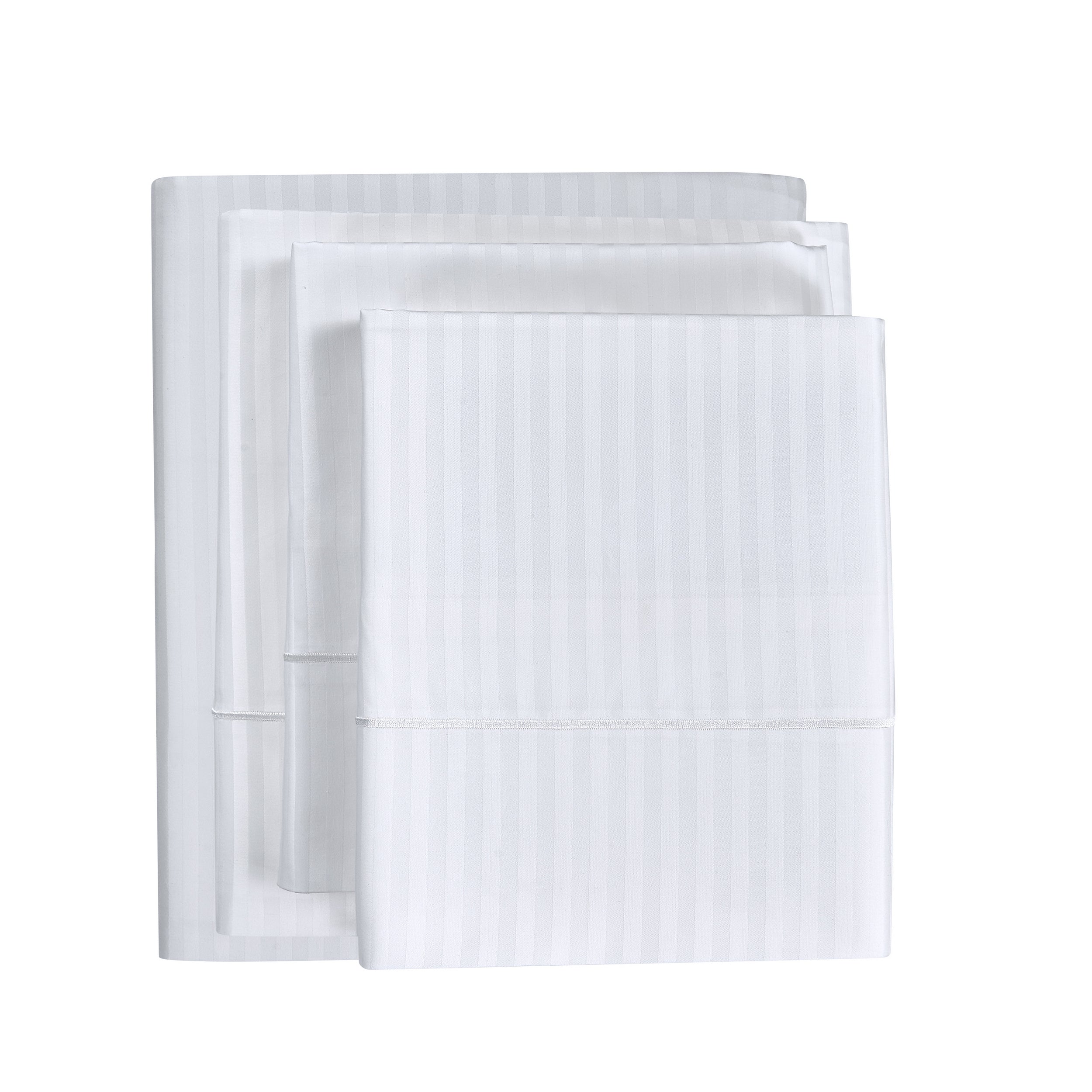 Set of white towels with a subtle pattern on a white background