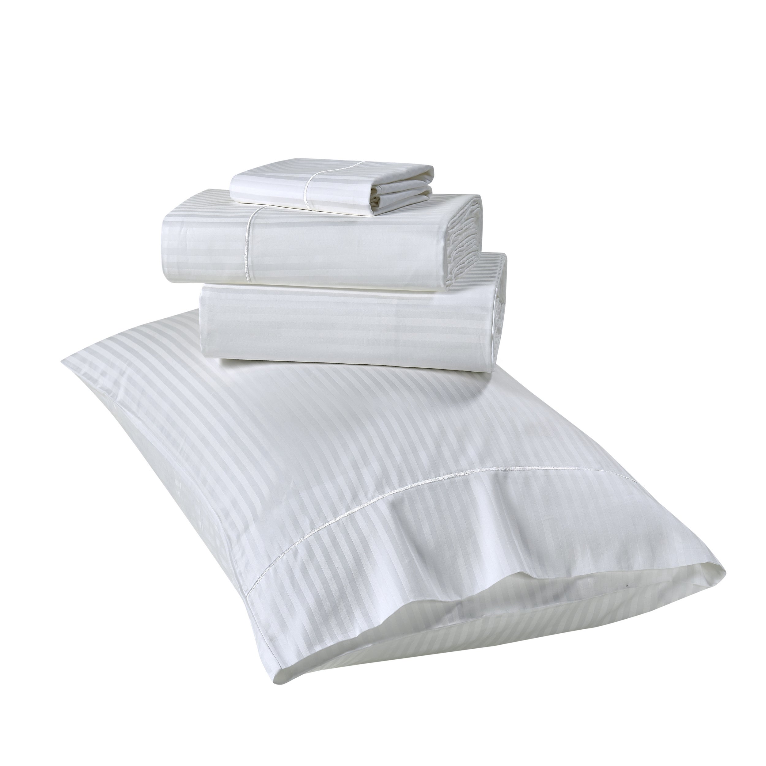 Set of white bedding including a duvet cover, pillowcases, and bed sheets on a white background.