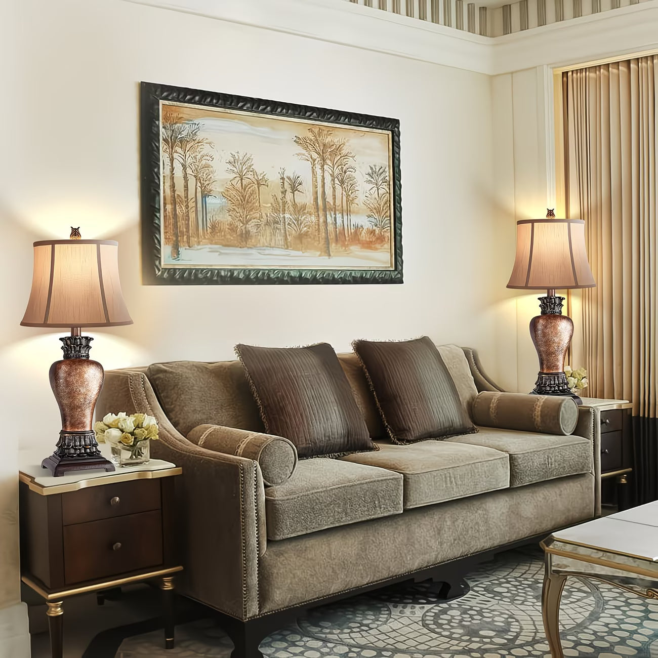 Living room with a beige sofa, two lamps, and a painting on the wall.