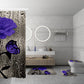 Bathroom with decorative shower curtain featuring purple flowers and butterfly, matching bath mats on floor and toilet.