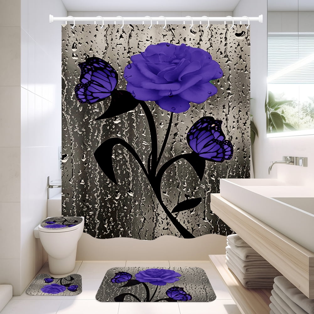 Bathroom with a decorative shower curtain featuring purple flowers and butterflies.