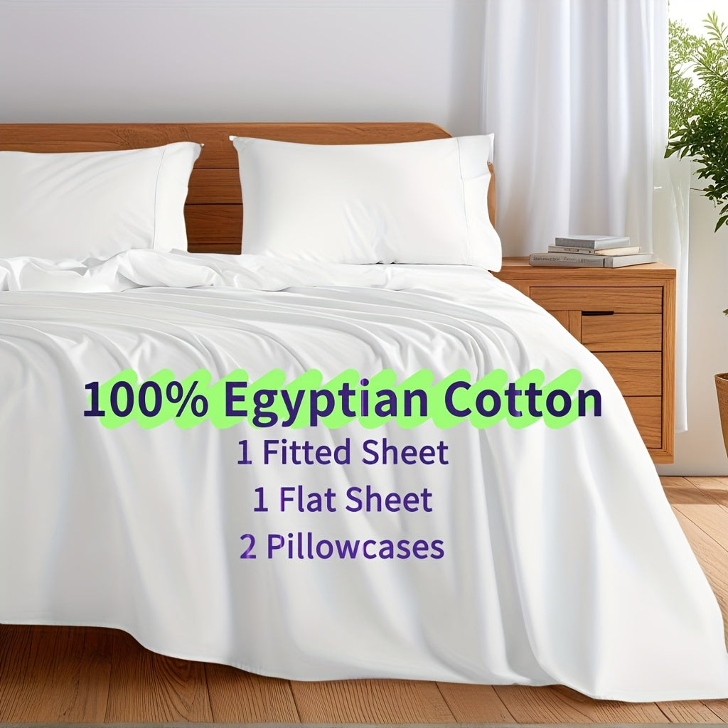 White bedding set with '100% Egyptian Cotton' text on a bed in a bedroom setting.