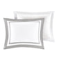 Two white pillows with gray decorative borders on a white background