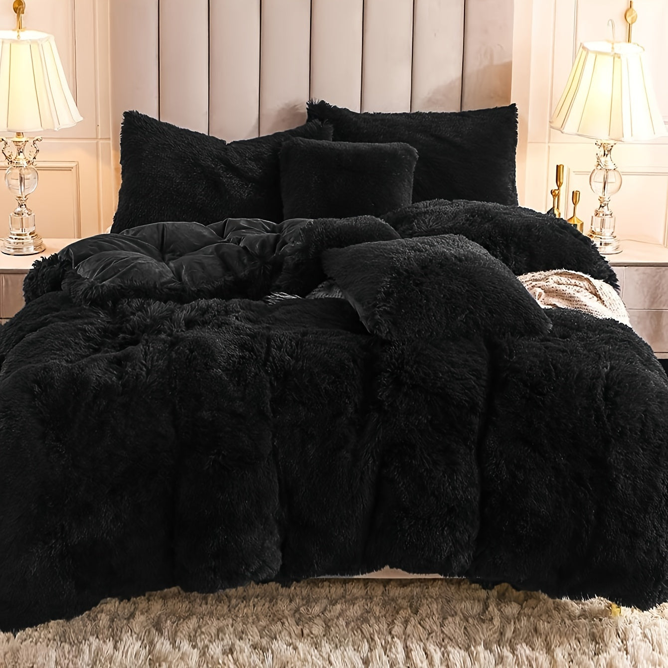Black fluffy comforter on a bed with pillows in a bedroom setting.