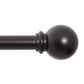 Black curtain rod with spherical finial on a white background