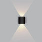 Modern wall-mounted light fixture on a gray background