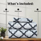 Set of patterned bed sheets with flat sheet, pillowscases, and fitted sheet on a wooden surface.