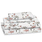 Floral patterned bed sheets on a white background