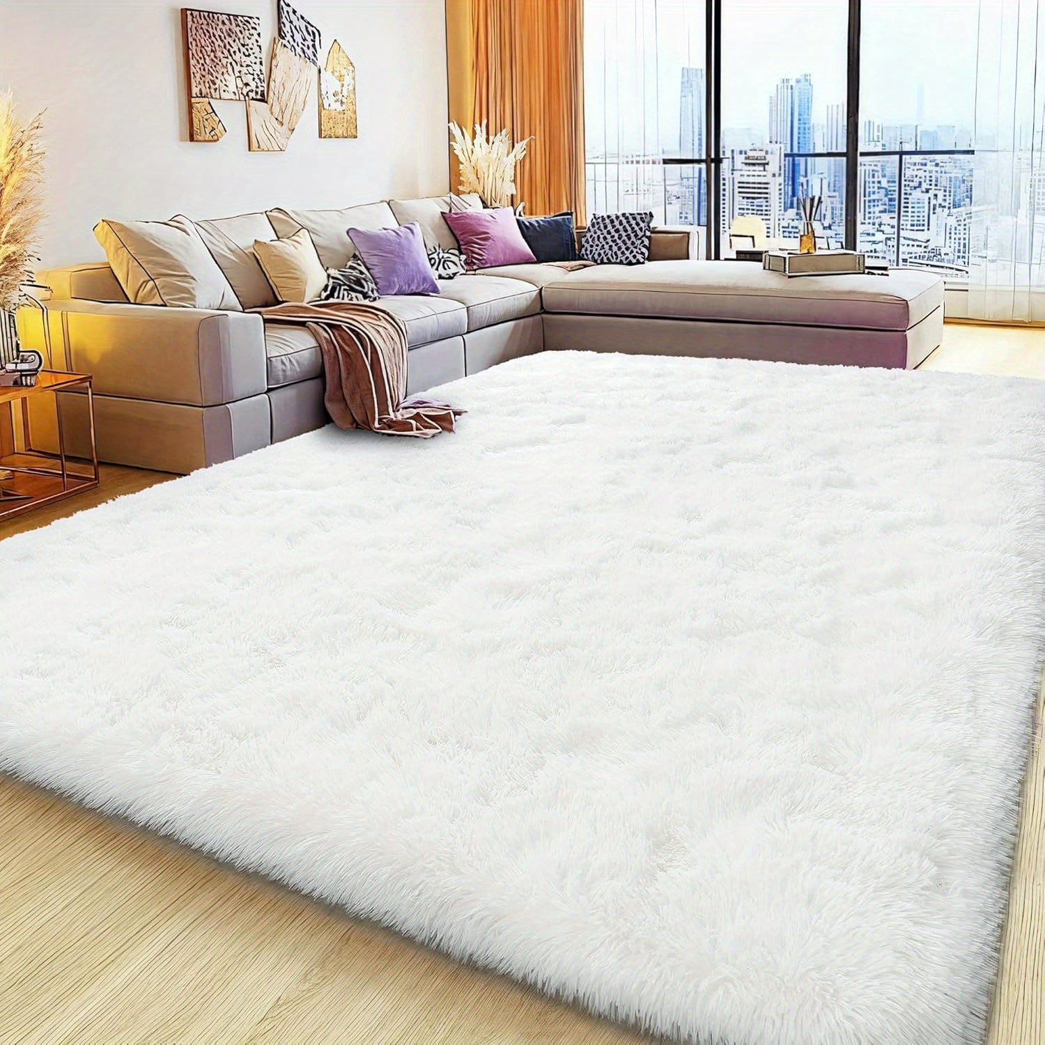 White fluffy rug in a living room with a sectional sofa and city view.