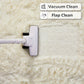 Vacuum cleaner head cleaning a white carpet with 'Vacuum Clean' and 'Flap Clean' text.