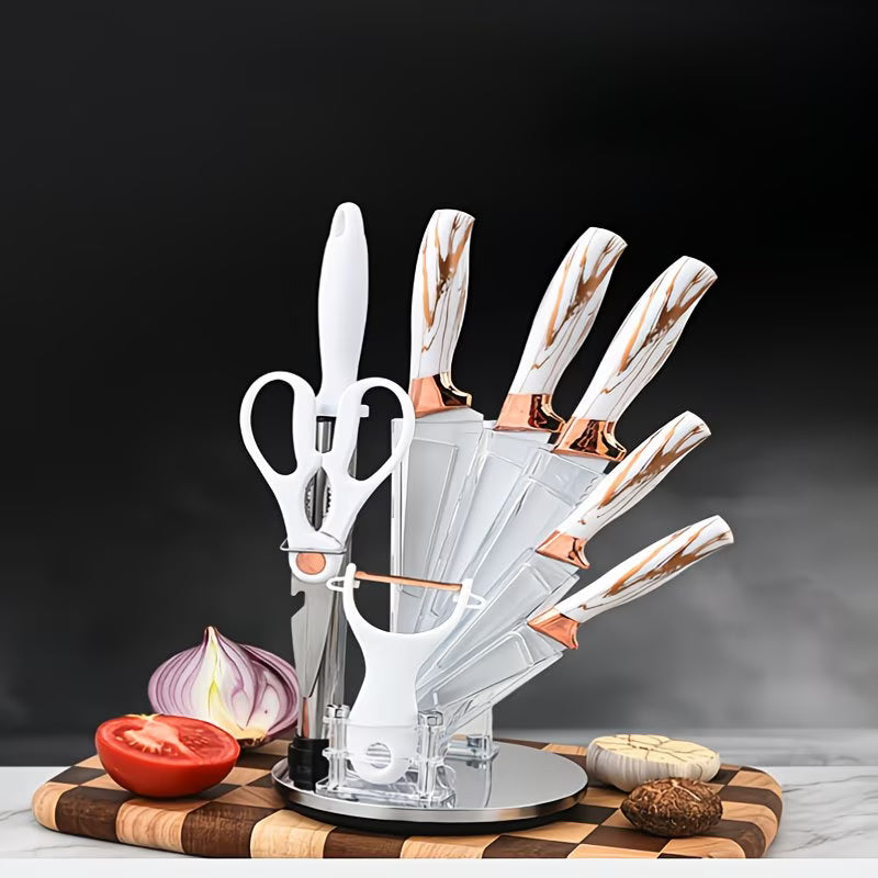 Set of knives with rose gold handles on a stand, surrounded by kitchen items on a dark background