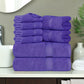 Stack of purple towels on a bathroom counter with a neutral background