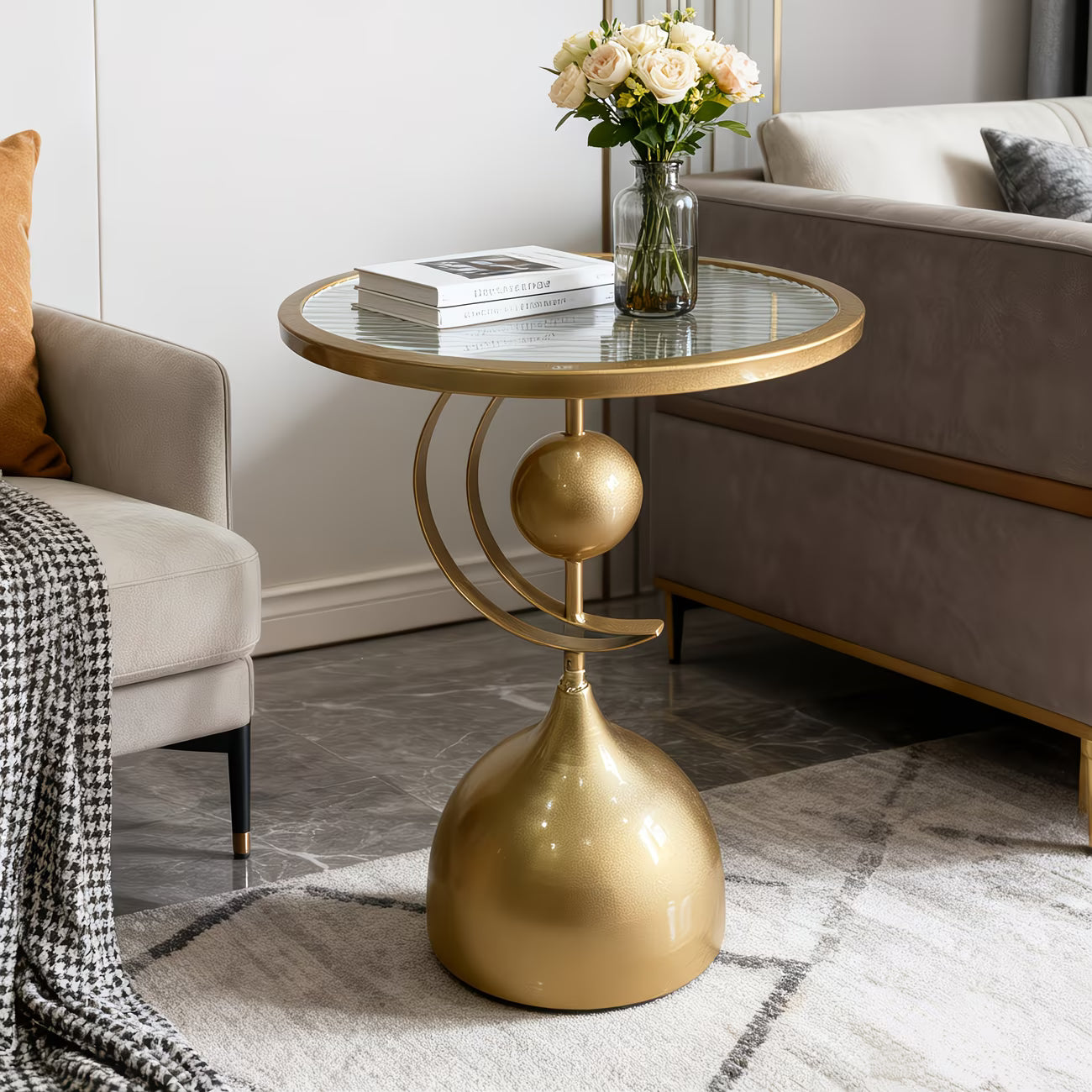 Gold side table with a glass top in a living room setting