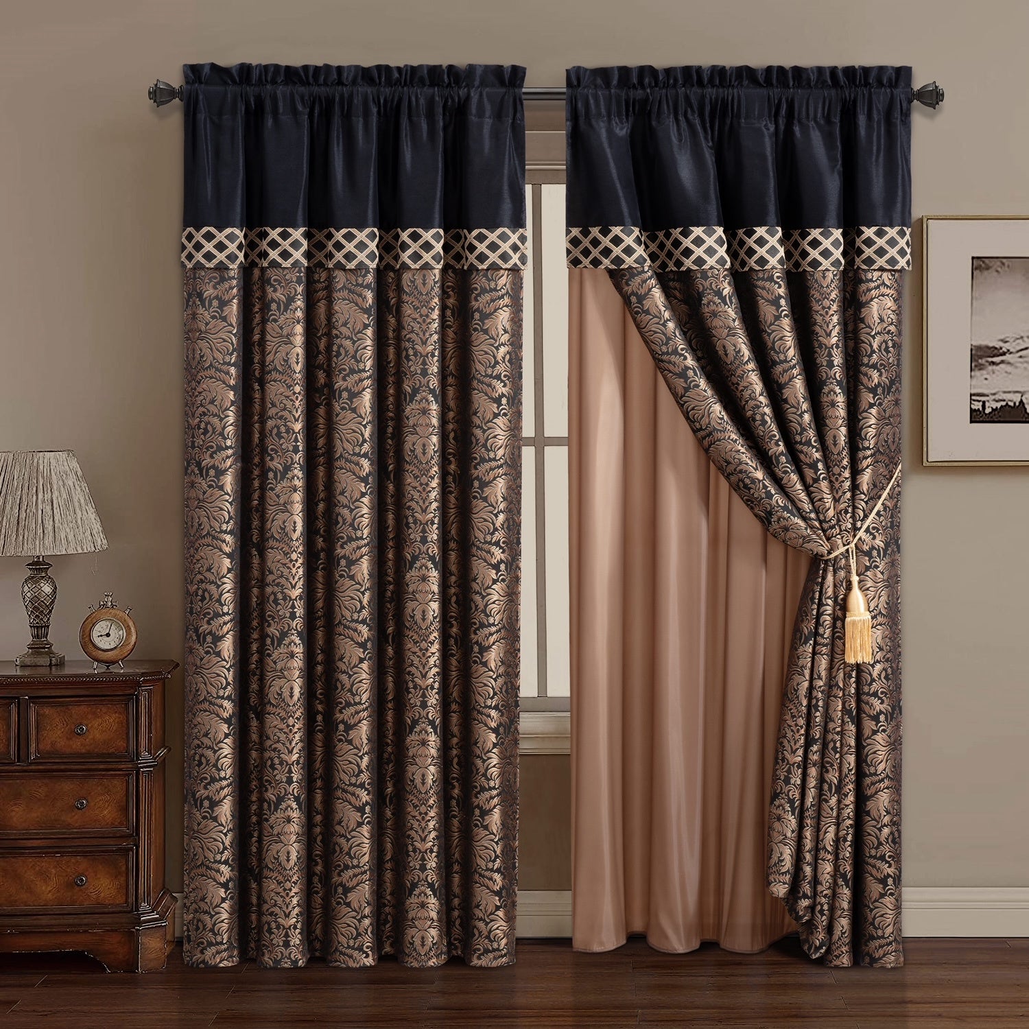 Decorative curtains with intricate patterns in a room setting.