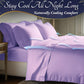 Purple bedding set with pillows on a bed in a bedroom, featuring text about cooling comfort.