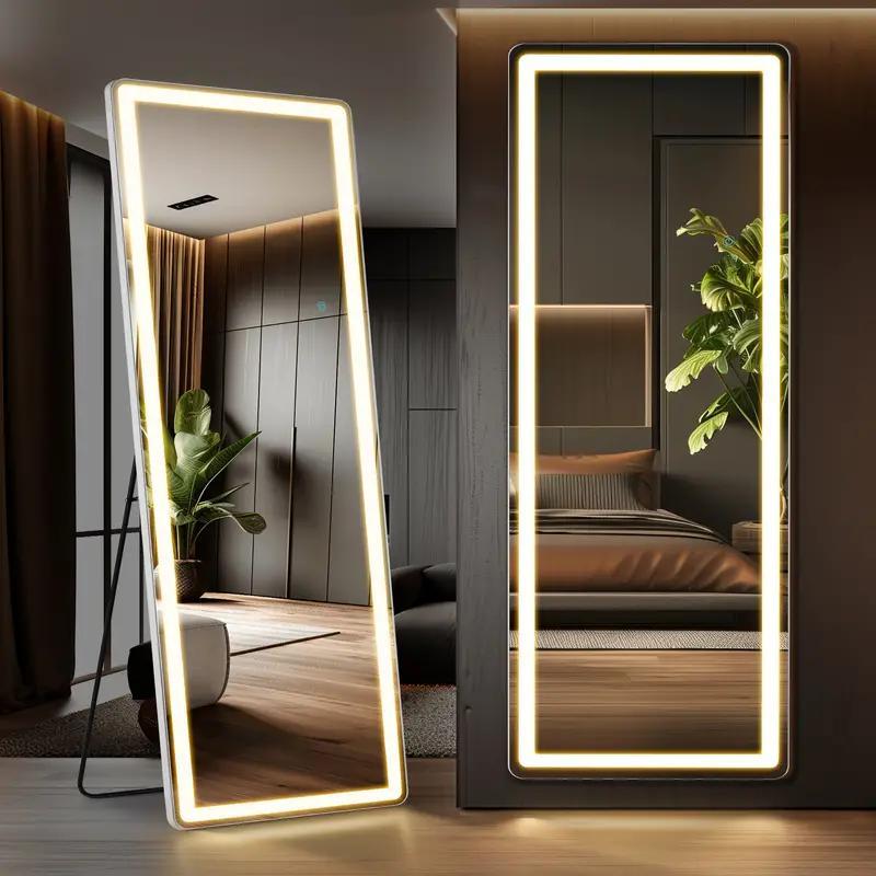 Two illuminated standing mirrors in a modern interior setting.