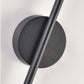 Black wall-mounted light fixture on a white background
