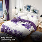 Bedroom with purple floral bedding and decor