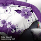 Purple floral bedding set on a bed with a laptop in the foreground.