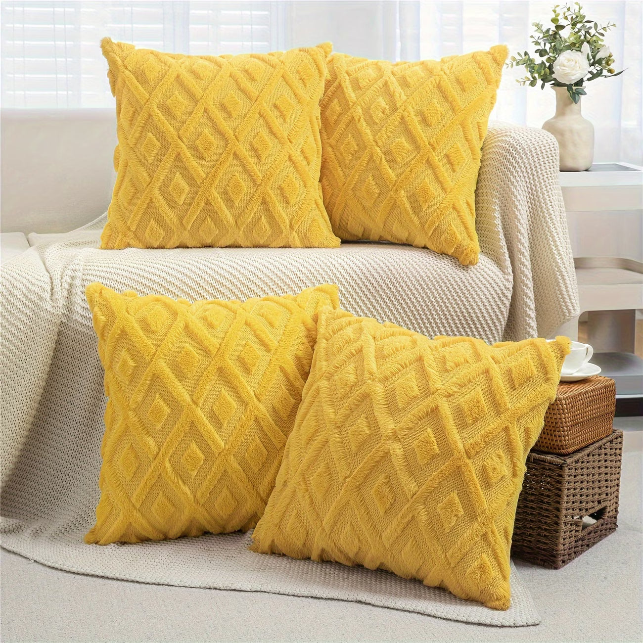 Yellow textured pillows on a sofa in a living room setting