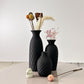 Three black textured vases