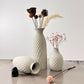 Set of decorative vases with textured patterns 