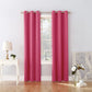 Pink curtains hanging in a room with a lamp and decor items.