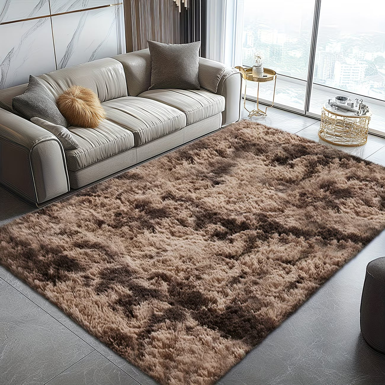 Modern living room with a plush brown rug, gray sofa, and large windows.