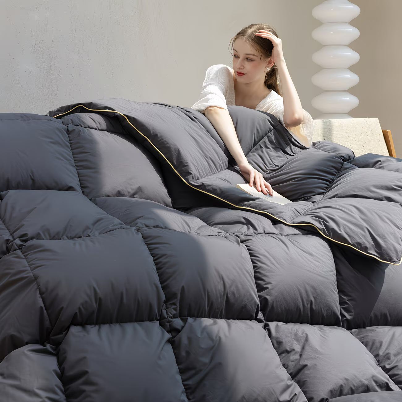 gray comforter in a modern room.