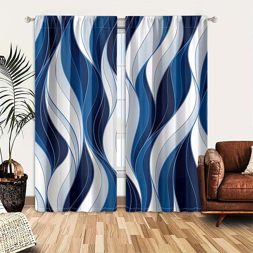 Blue and white wavy patterned curtains in a room with a brown couch and plant.