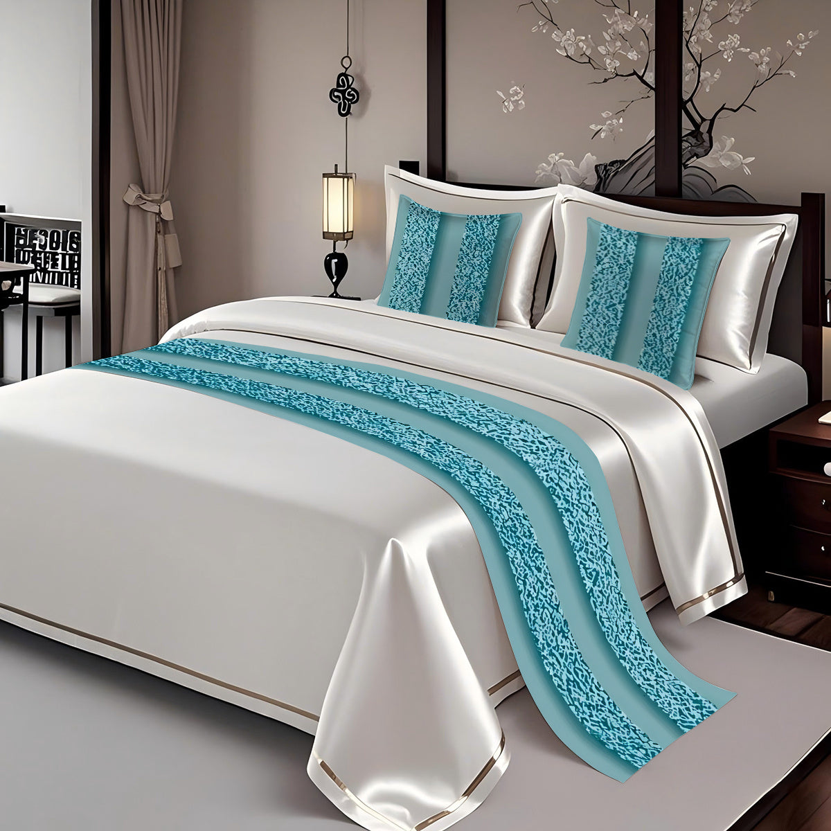 Bed with white bedding and blue decorative runner and pillows in a bedroom setting.