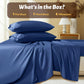 Blue bedding set with flat sheet, fitted sheet, and pillowcases on a bed in a bedroom setting.