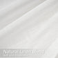 Close-up of white natural linen blend fabric with text overlay.