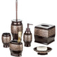 Bathroom accessory set with decorative patterns on a white background