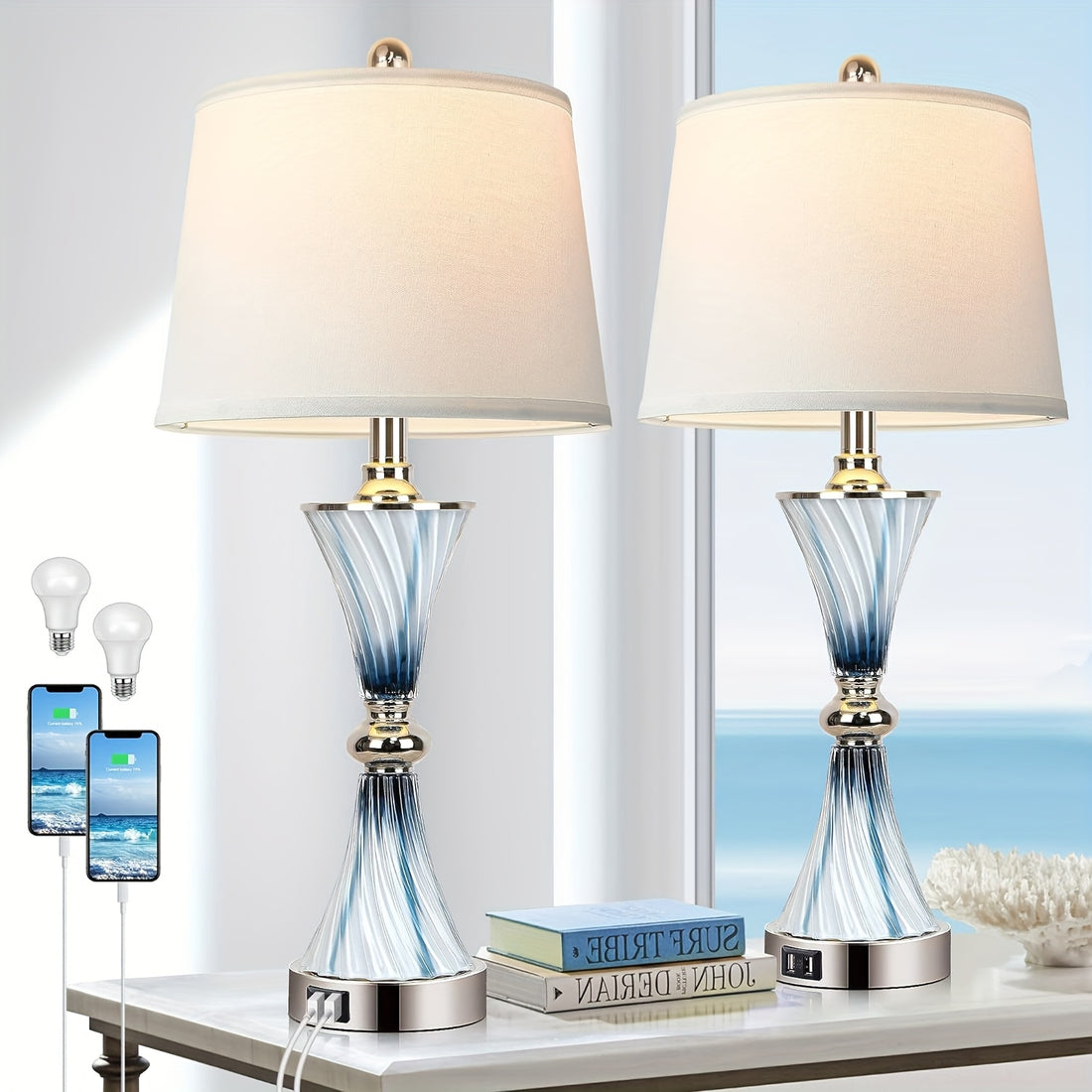 Two table lamps with USB ports on a surface with electronic devices and books.