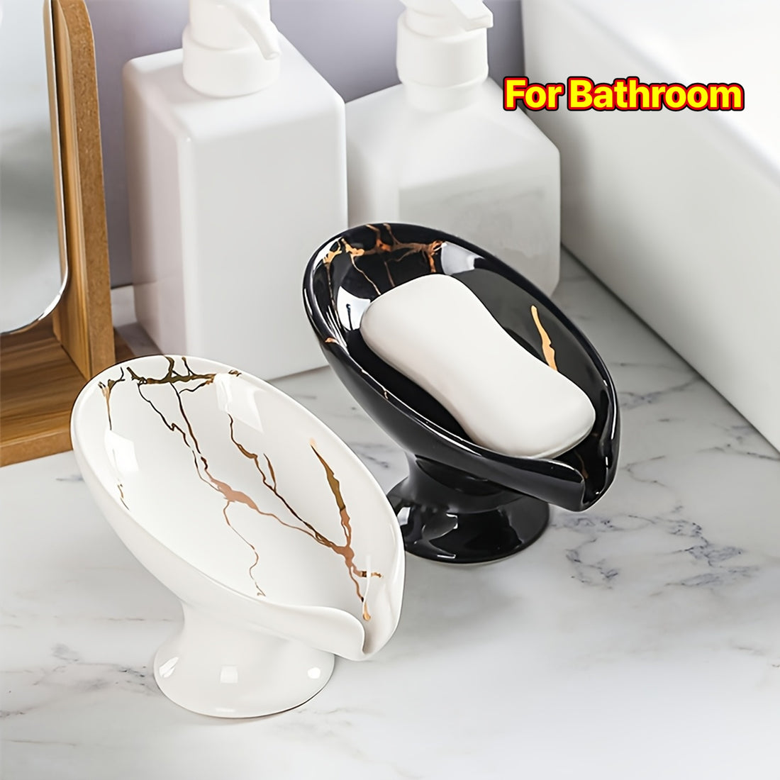 Two marble-patterned soap dishes with a bar of soap on a bathroom counter.