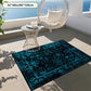 Decorative blue rug on a tiled floor with a modern chair and table in the background.