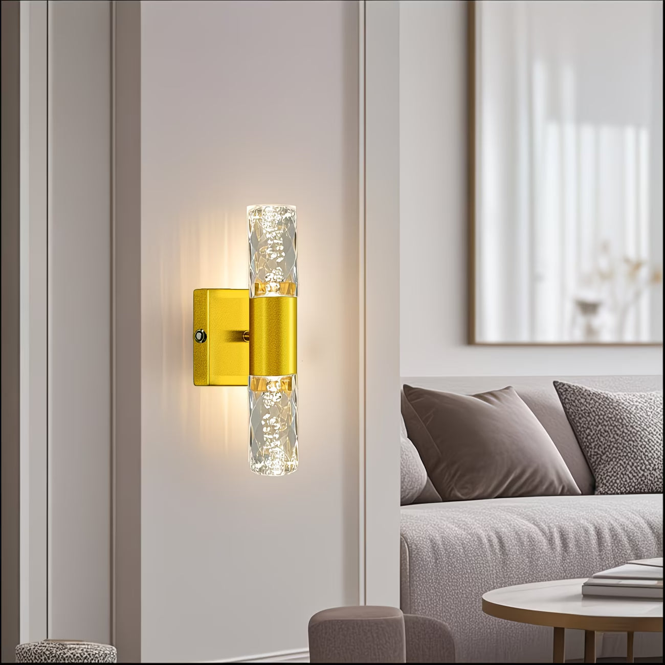 Modern wall sconce with yellow fixture and clear glass shade in a living room setting.