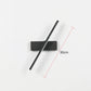 Black rectangular light fixture with a black rod on a white background, showing measurement details.