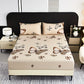 Bed with butterfly patterned bedding in a bedroom setting