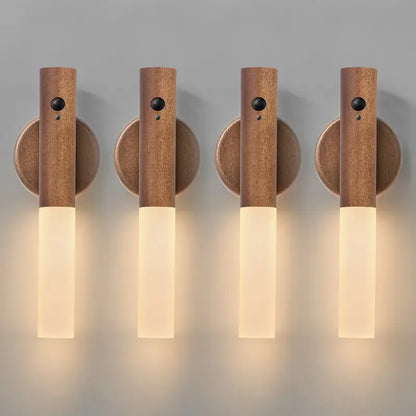 Four wooden wall sconces on a gray background