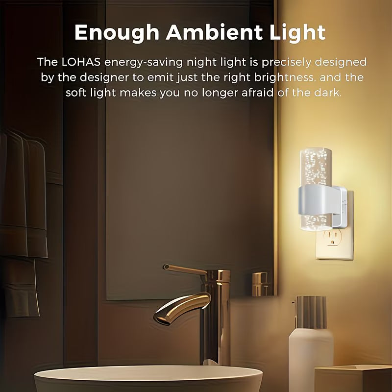 Bathroom scene with a night light on the wall, emitting soft light.