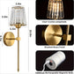 Wall-mounted light fixture with clear crystal lampshade, brushed brass finish, and 10000mAh rechargeable magnetic bulb.