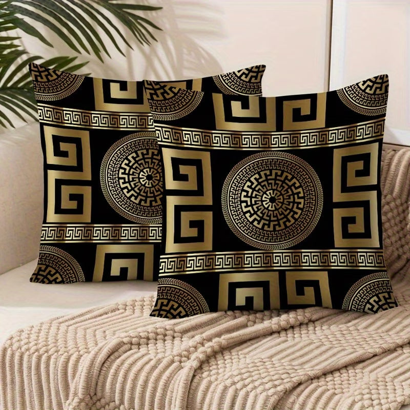 Decorative pillows with Greek key pattern on a couch