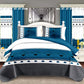 Bedroom with blue and white bedding set, curtains, and nightstands.
