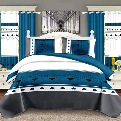 Blue and white bedding set on a bed with matching curtains and decor.